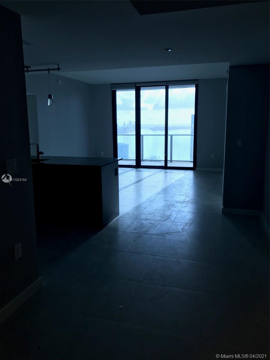1010 Brickell Avenue, Unit 3204 Miami, FL 33131 - Photo 19 of 32 a view of an empty room with a window