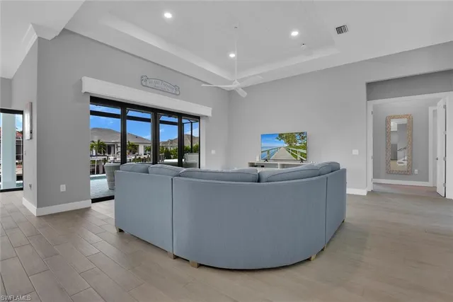 a living room with furniture and a couch