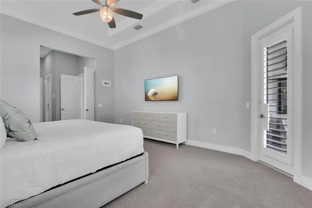 a spacious bathroom with a tub sink and mirror