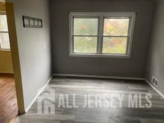 a view of a house with a street