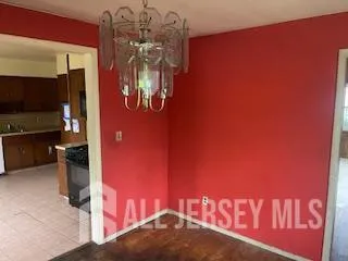 a view of a wooden floor in a room