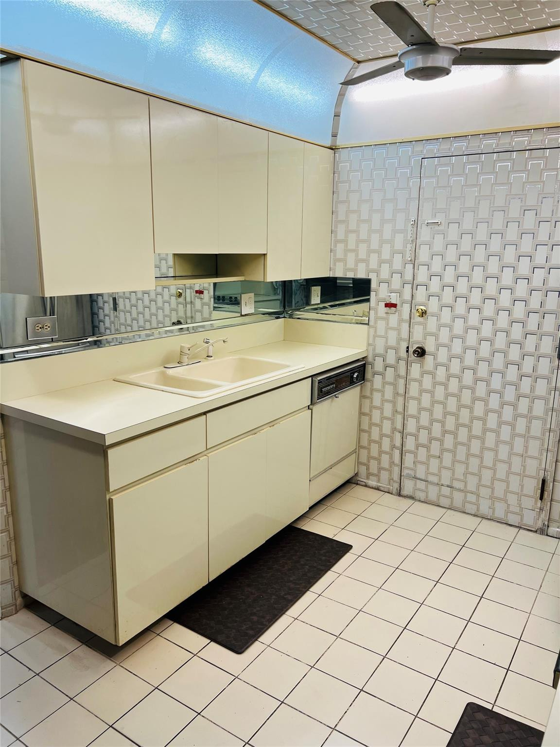 800 Northeast 195th Street, Unit 307 Miami, FL 33179 - Photo 24 of 63 a bathroom with a sink and a mirror