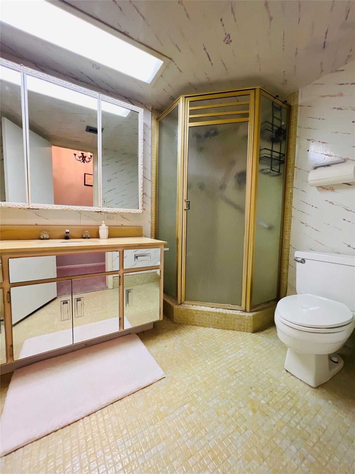 800 Northeast 195th Street, Unit 307 Miami, FL 33179 - Photo 37 of 63 a bathroom with a sink a toilet and shower