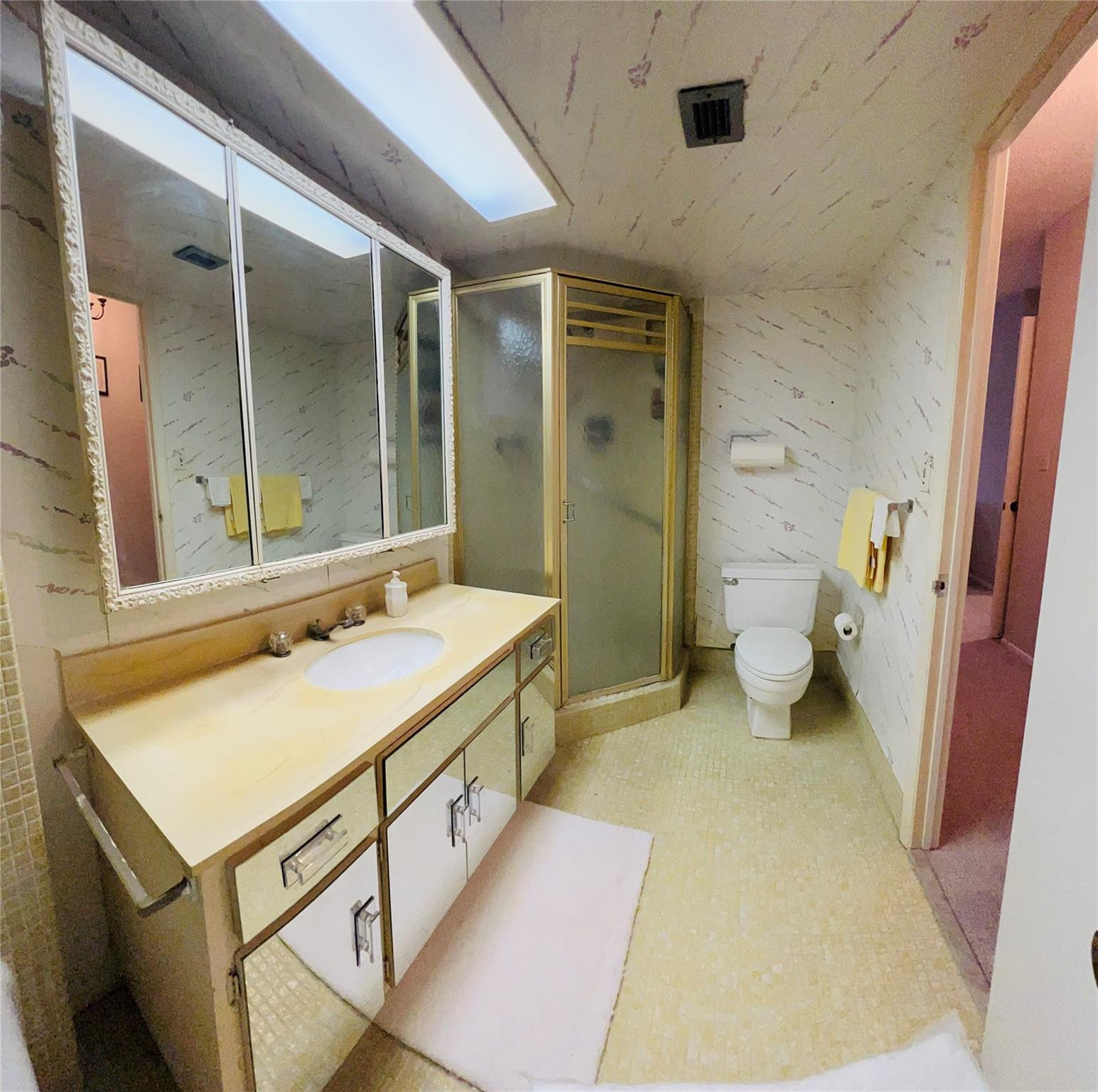 800 Northeast 195th Street, Unit 307 Miami, FL 33179 - Photo 38 of 63 a bathroom with a sink a toilet and shower