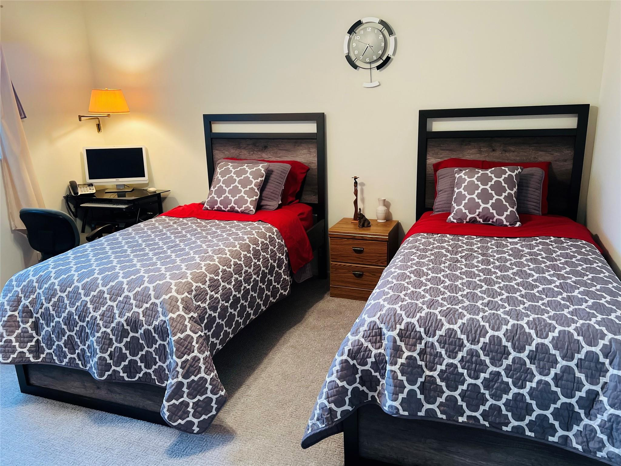 800 Northeast 195th Street, Unit 307 Miami, FL 33179 - Photo 44 of 63 a bedroom with double bed and a lamp