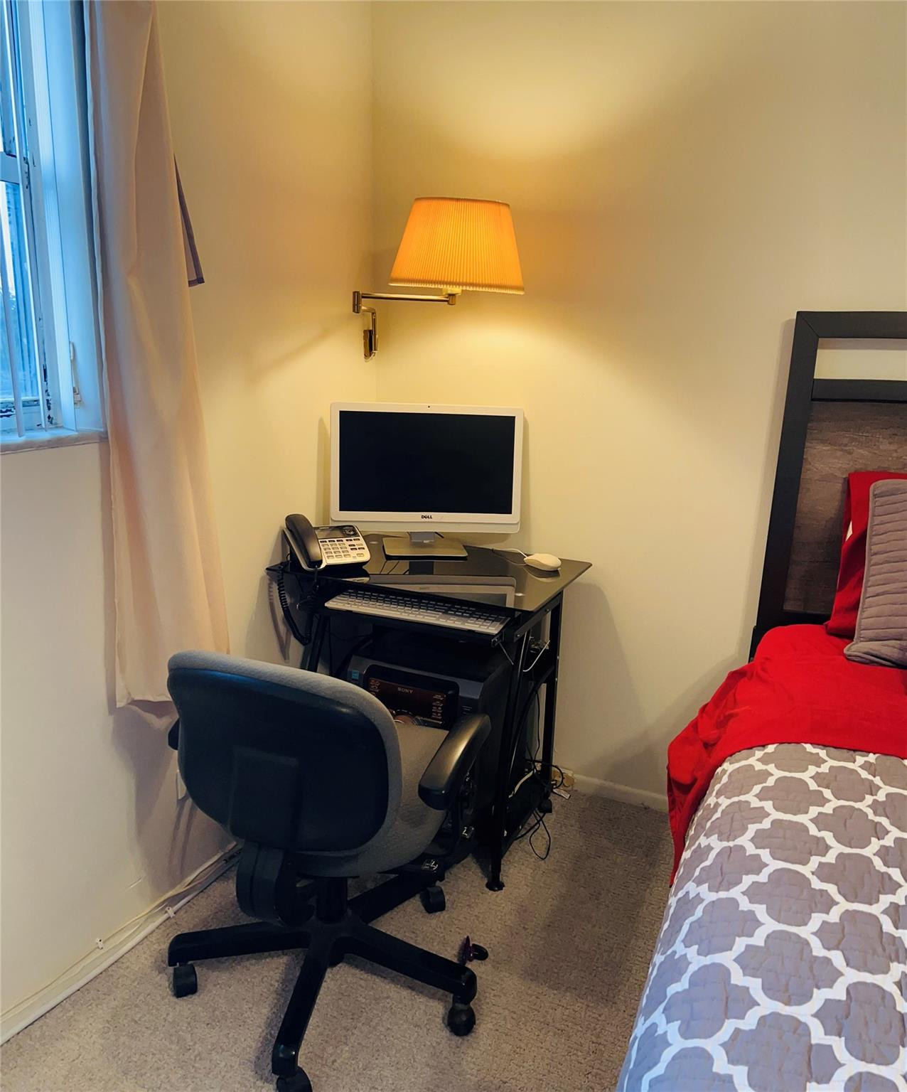 800 Northeast 195th Street, Unit 307 Miami, FL 33179 - Photo 45 of 63 a view of a workspace with furniture and a mirror