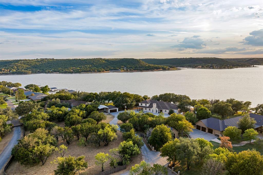 4877 Pike Road Graham, TX 76450 - Photo 2 of 40 Situated on the quieter west side of PK, this property offers deep water and million dollar sunsets.