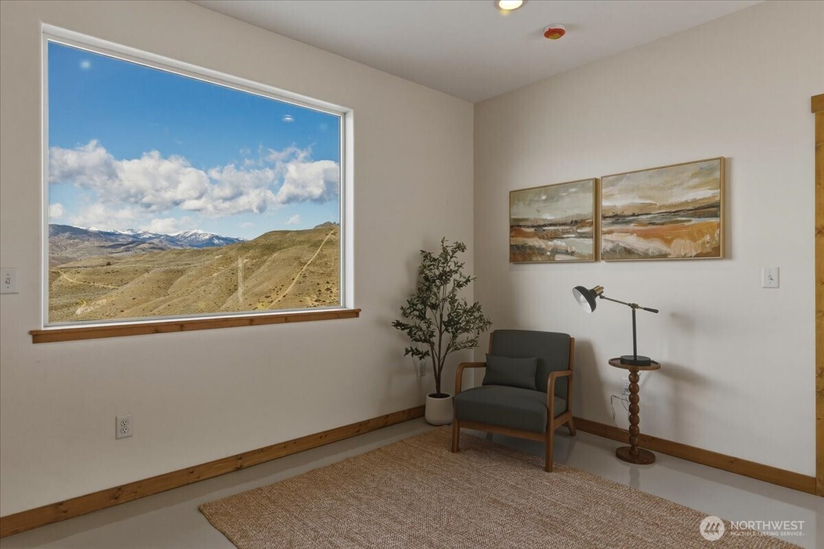 2 Island View Lane Methow, WA 98834 - Photo 12 of 35 a living room with furniture and a painting on the wall