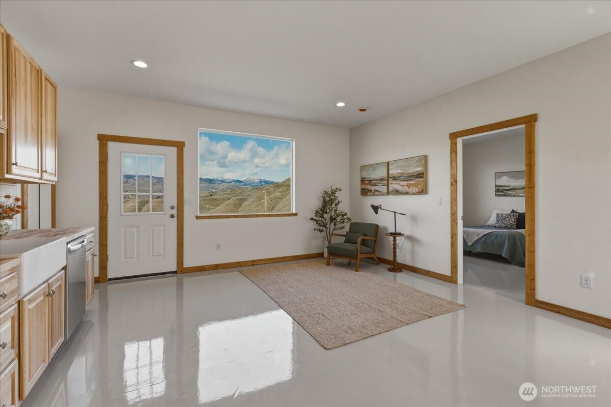 2 Island View Lane Methow, WA 98834 - Photo 13 of 35 a living room with furniture and a large window