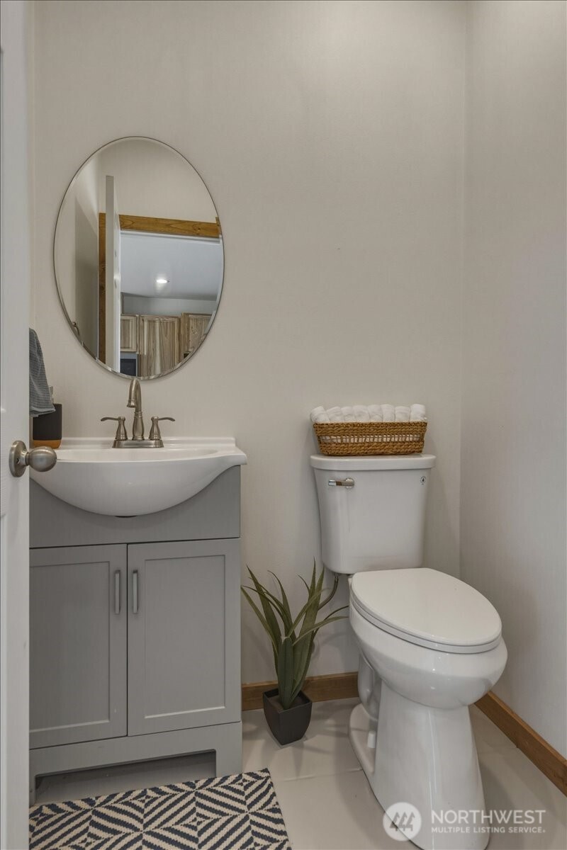 2 Island View Lane Methow, WA 98834 - Photo 19 of 35 a bathroom with a sink toilet and a mirror