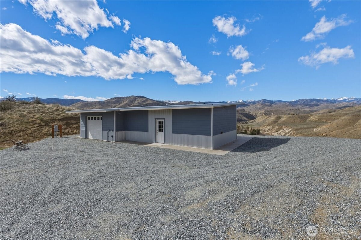 2 Island View Lane Methow, WA 98834 - Photo 2 of 35 a view of a house with a yard
