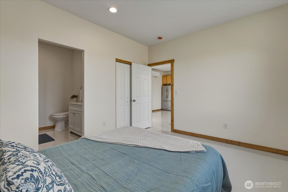 2 Island View Lane Methow, WA 98834 - Photo 22 of 35 a bedroom with a bed and toilet