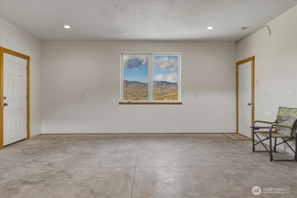 2 Island View Lane Methow, WA 98834 - Photo 31 of 35 a view of an empty room with a window