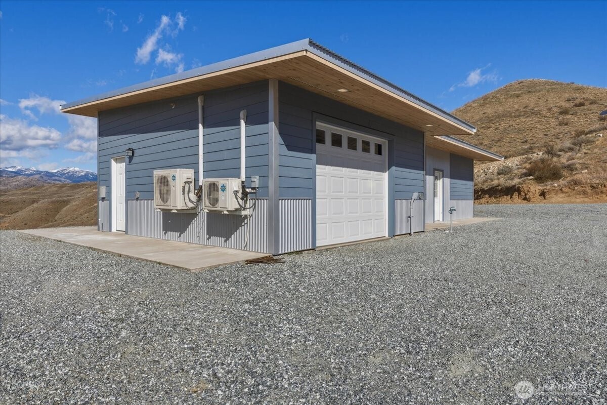 2 Island View Lane Methow, WA 98834 - Photo 4 of 35 a front view of a house with a yard