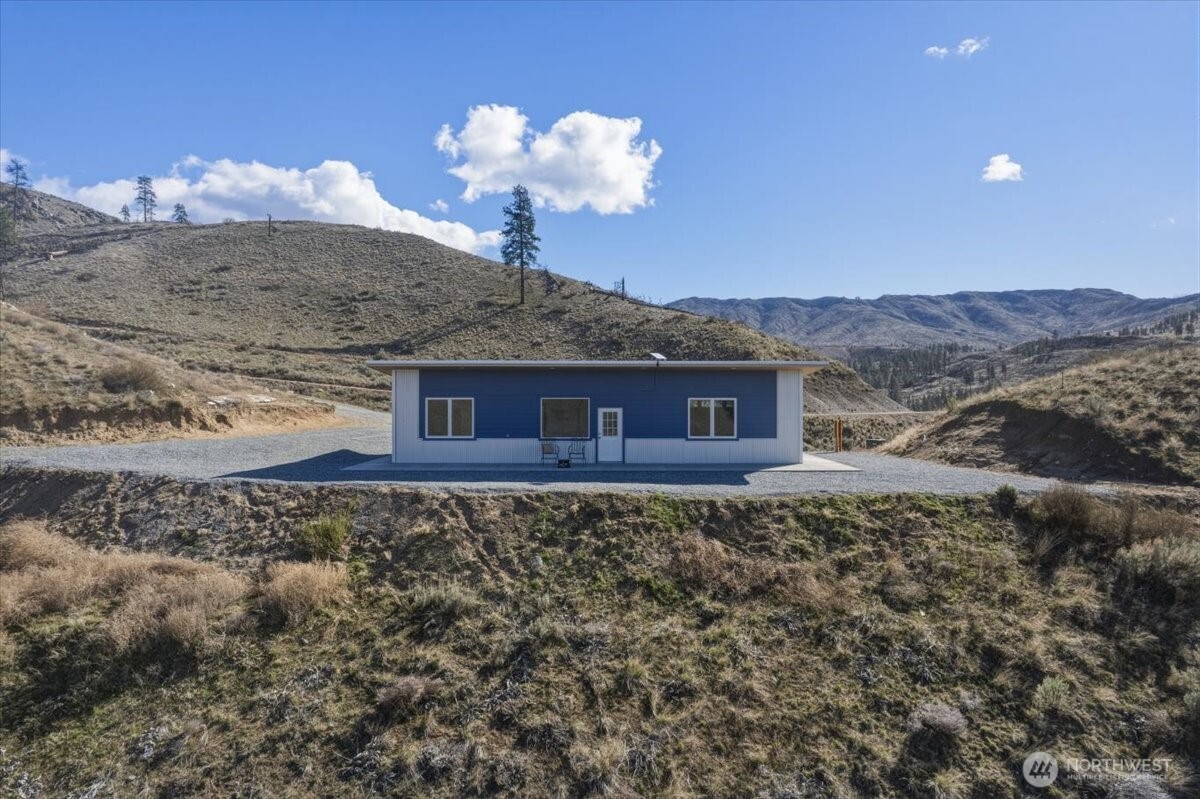 2 Island View Lane Methow, WA 98834 - Photo 7 of 35 a view of a house with a yard