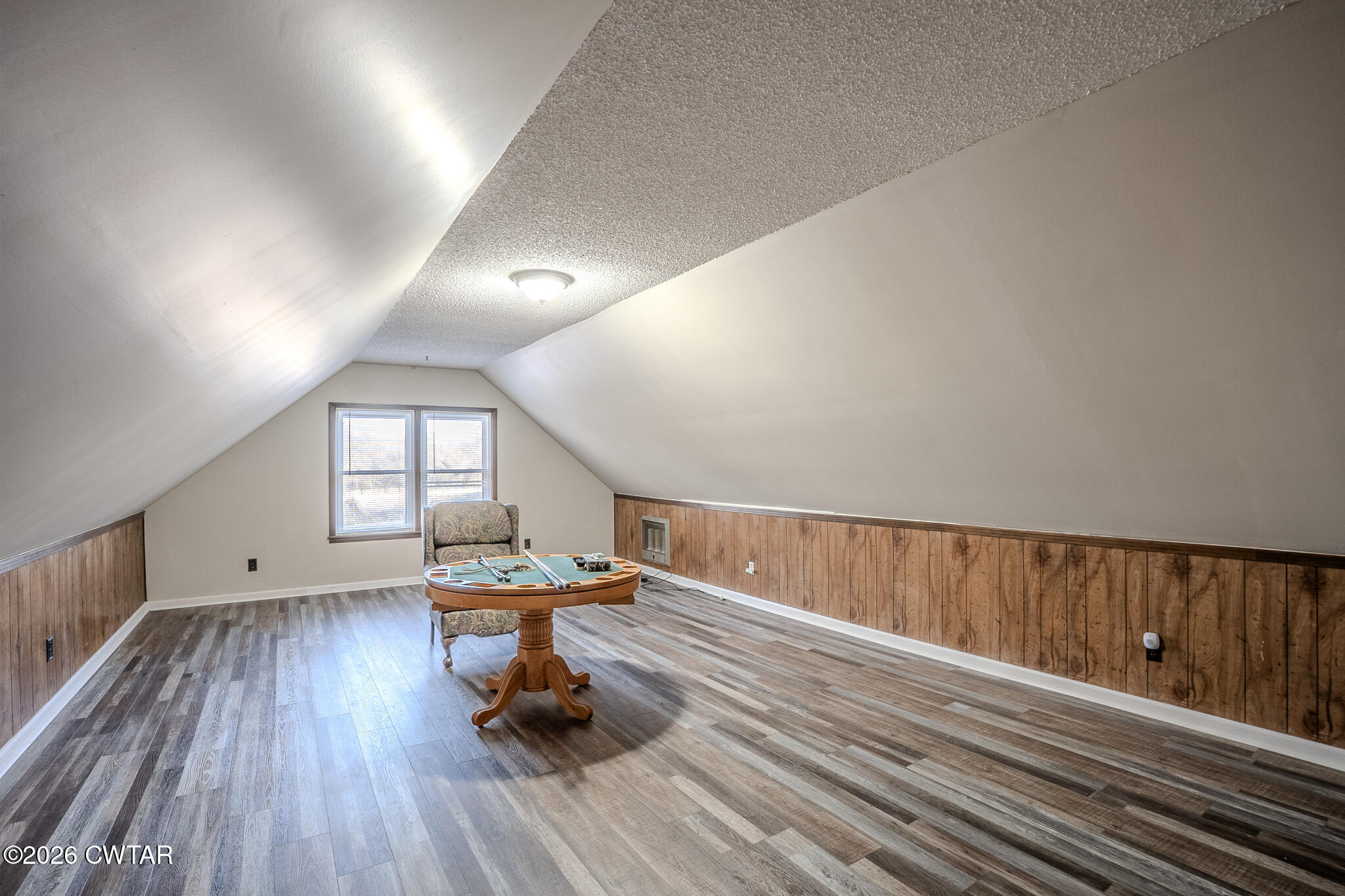 2467 Windrow Road Brownsville, TN 38012 - Photo 26 of 32 a room with wooden floor and furniture