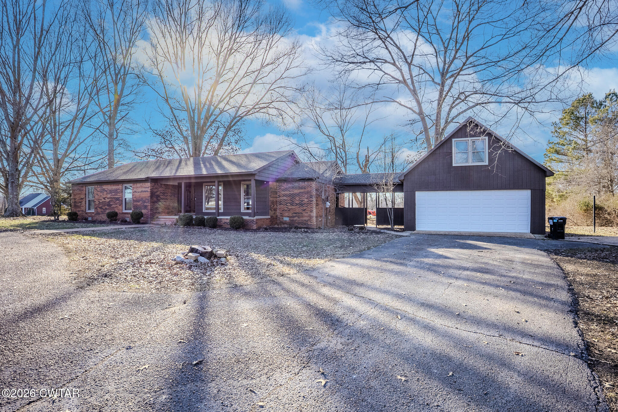 2467 Windrow Road Brownsville, TN 38012 - Photo 3 of 32 a view of a house with a snow in the yard