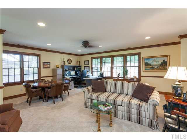 12405 Whartons Way Raleigh, NC 27613 - Photo 14 of 23 HUGE BONUS ROOM WITH LOTS OF POTENTIAL FOR ANY USE. BEAUTIFL MOLDING DETAILS THROUGHOUT AND LOTS OF WINDOWS TO ENJOY THE VIEWS. CEILING FAN AND RECESSED LIGHTING. Bonus Room