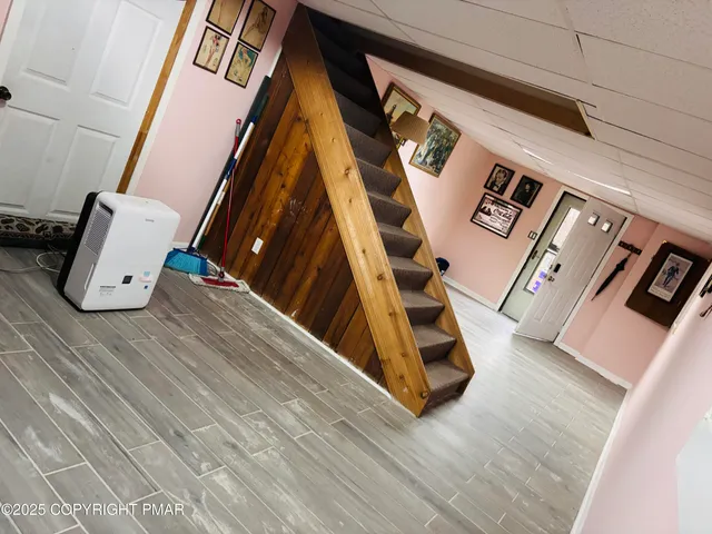 a view of house with snow on the background