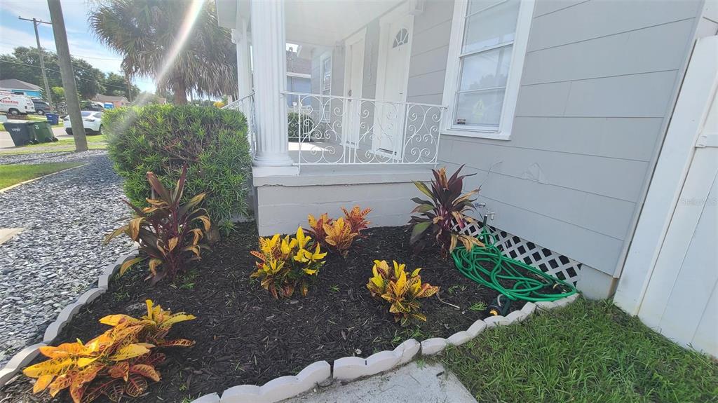 2519 West Walnut Street Tampa, FL 33607 - Photo 15 of 19 a front view of a house with a yard