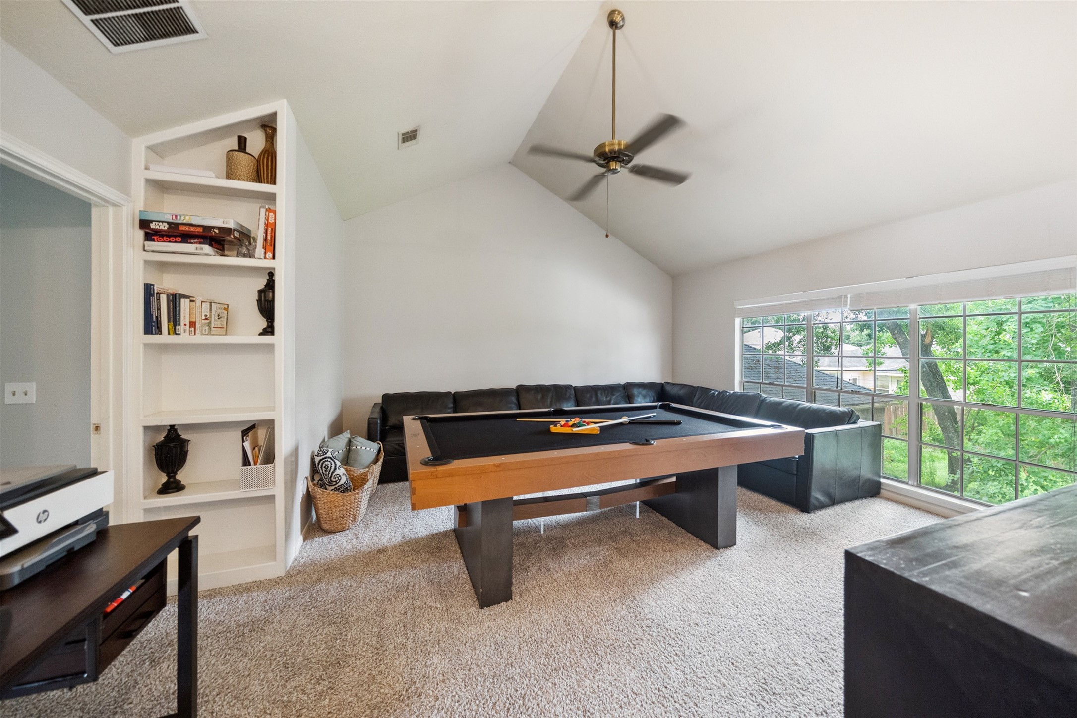 20407 Weald Way Street Spring, TX 77388 - Photo 23 of 31 a room with furniture and a window