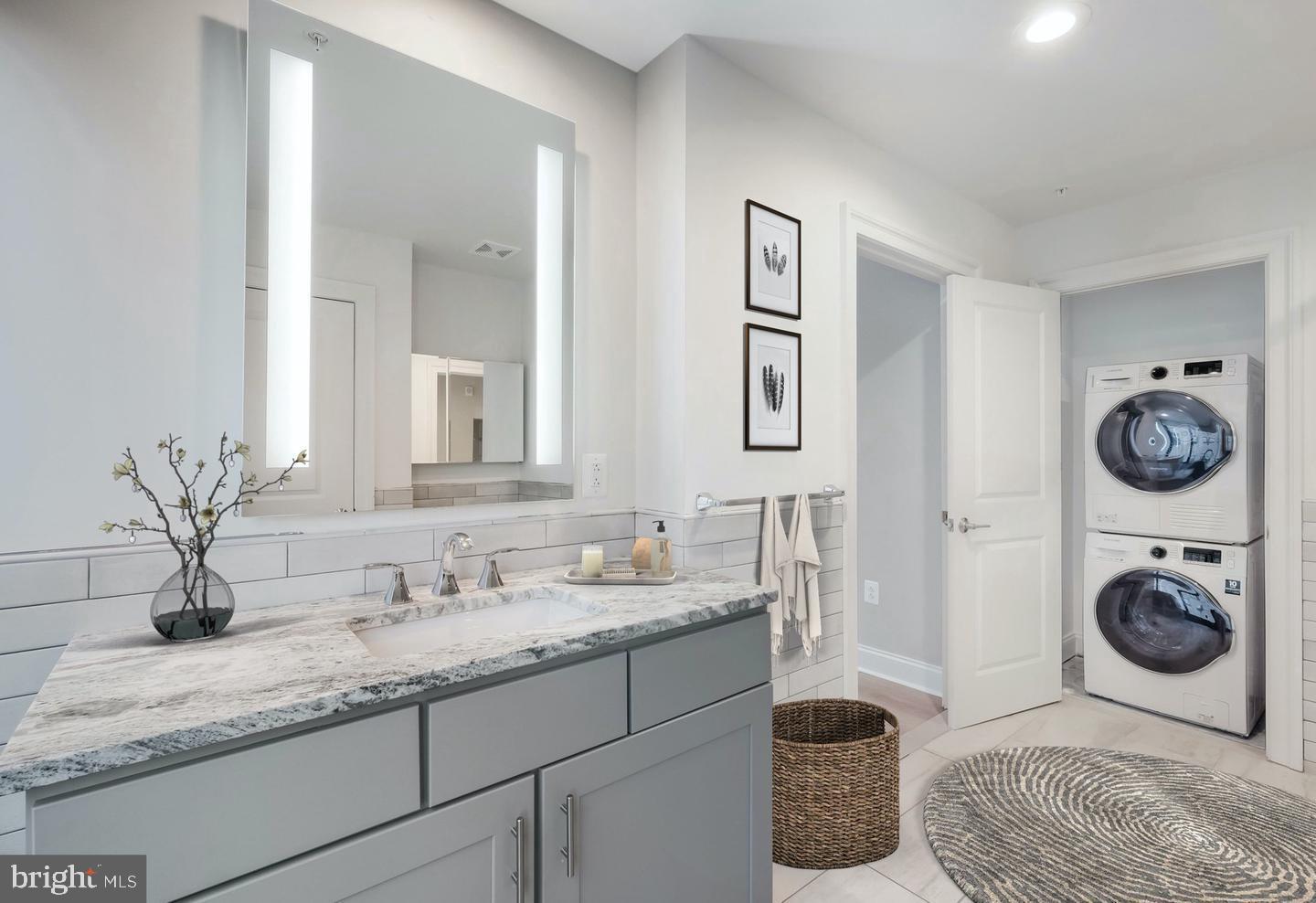 60 North 23rd Street, Unit 2013 Philadelphia, PA 19103 - Photo 11 of 46 a bathroom with a sink and a mirror