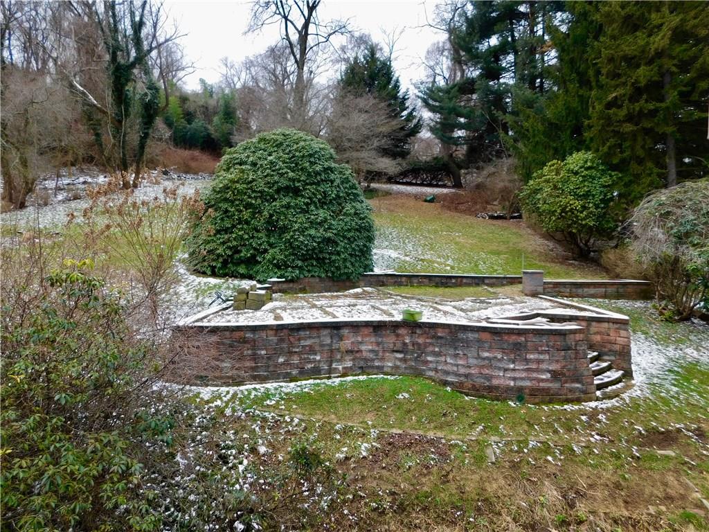 604 Cascade Road Forest Hills, PA 15221 - Photo 25 of 25 The backyard is terraced, nicely landscaped and very spacious. It is nearly twice as deep as most lots in the area.