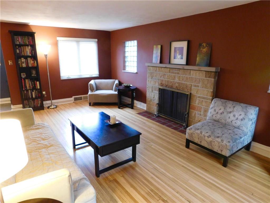 604 Cascade Road Forest Hills, PA 15221 - Photo 6 of 25 The living room is 21 feet long, with lots of light from the large casement windows at each end. These windows open up completely to bring in a wonderful breeze, and the house also has central air conditioning.
