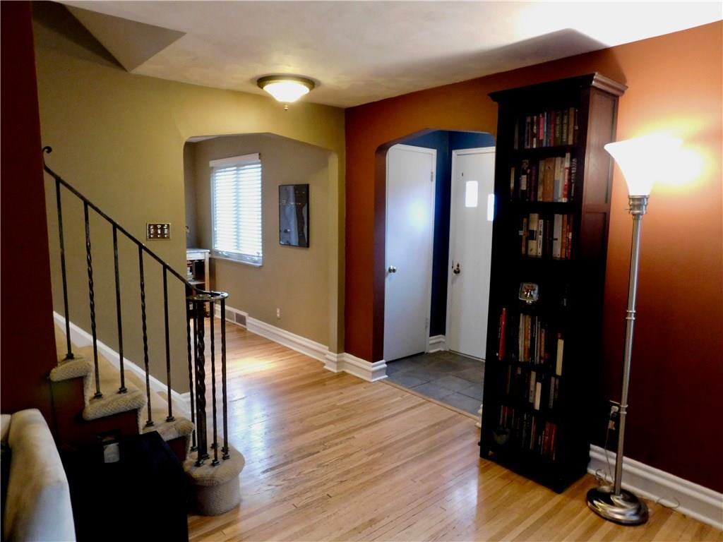 604 Cascade Road Forest Hills, PA 15221 - Photo 9 of 25 The entry has a coat closet and space for a bench or credenza. The flooring is ceramic tile. This house has unusual detailing on its baseboards, gives it even more character.