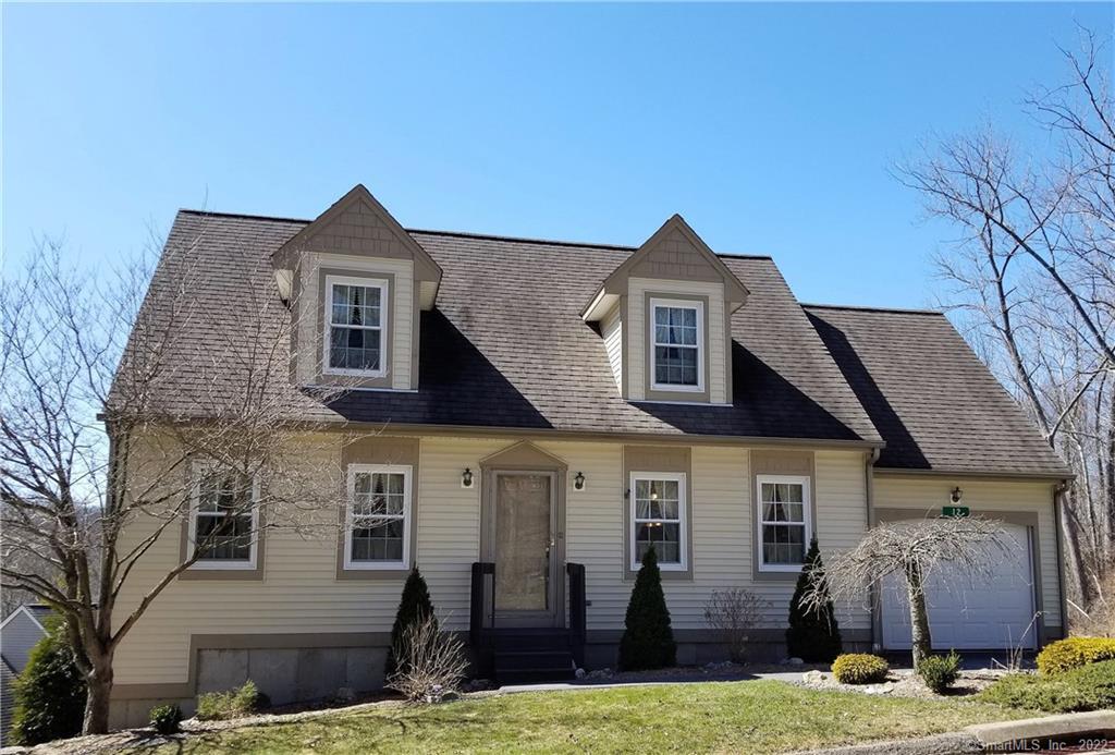12 Mill Landing Road, Unit 12 Hebron, CT 06248 - Photo 1 of 1 a front view of a house with a yard