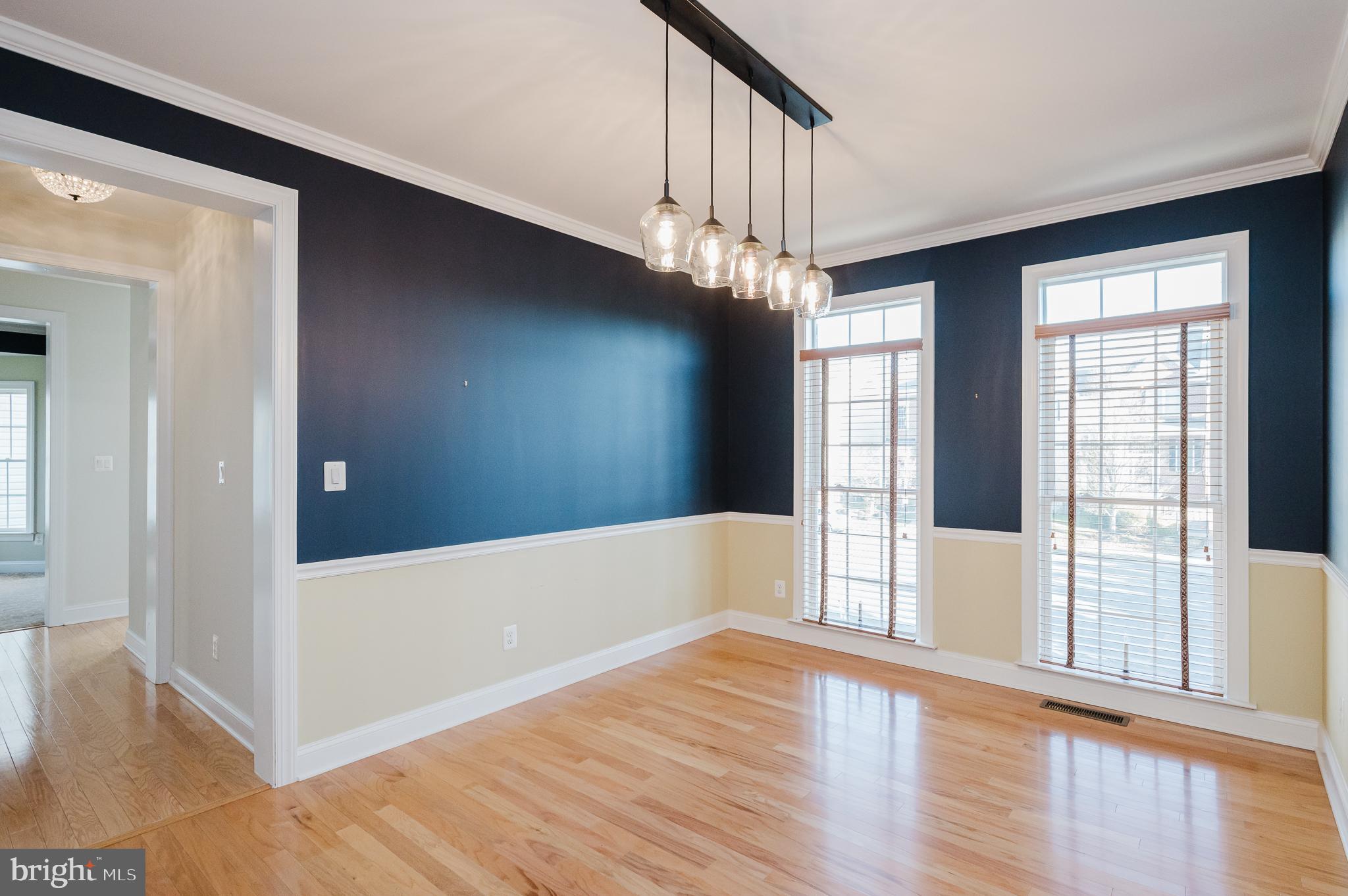 130 Fallston Meadow Court Fallston, MD 21047 - Photo 20 of 80 a view of an empty room with wooden floor and a window