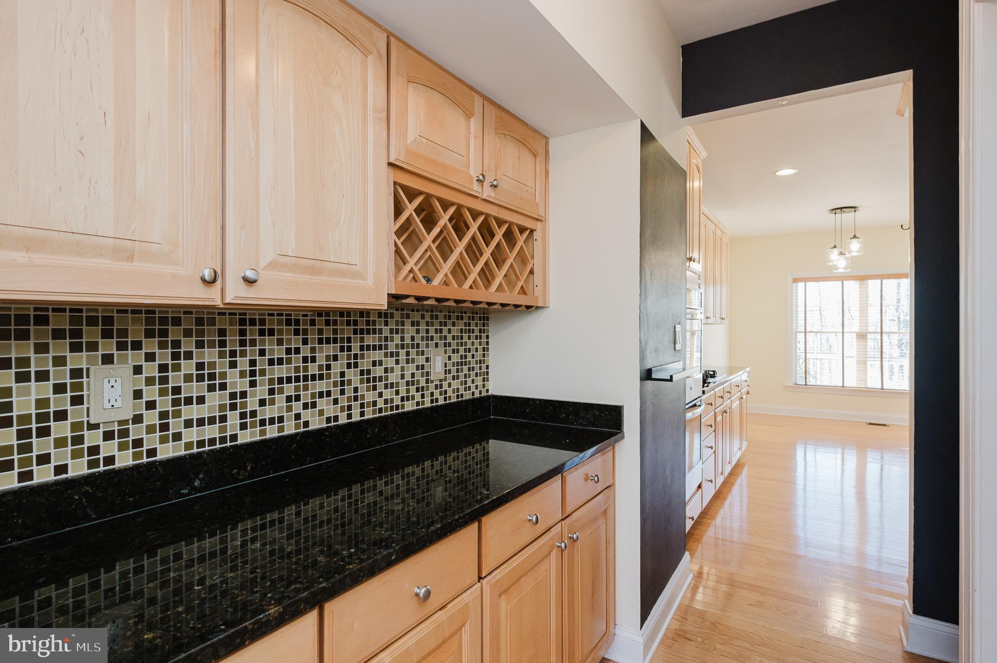 130 Fallston Meadow Court Fallston, MD 21047 - Photo 22 of 80 a kitchen with granite countertop a sink and cabinets