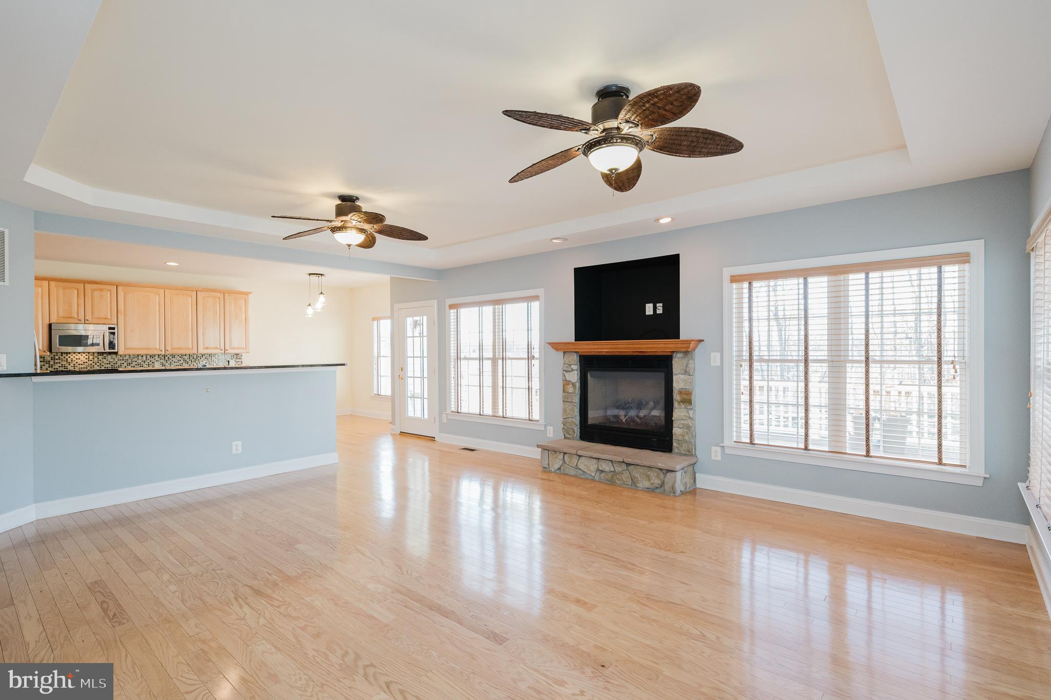 130 Fallston Meadow Court Fallston, MD 21047 - Photo 32 of 80 a view of an empty room with window and wooden floor