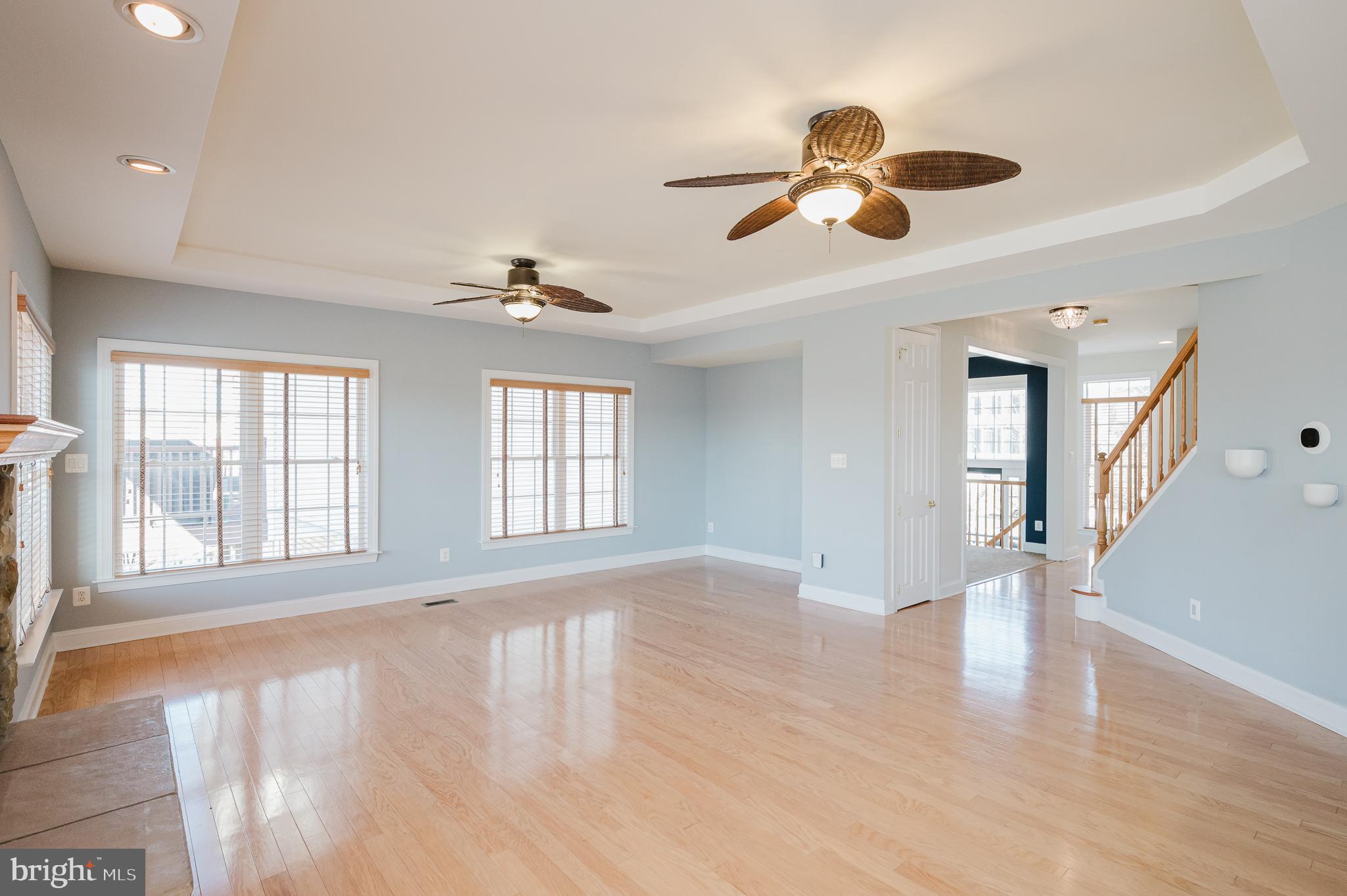 130 Fallston Meadow Court Fallston, MD 21047 - Photo 34 of 80 a view of an empty room with wooden floor and a window
