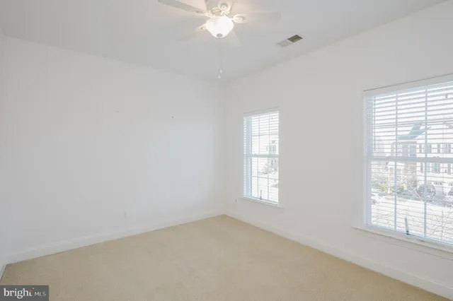 a view of a balcony with furniture