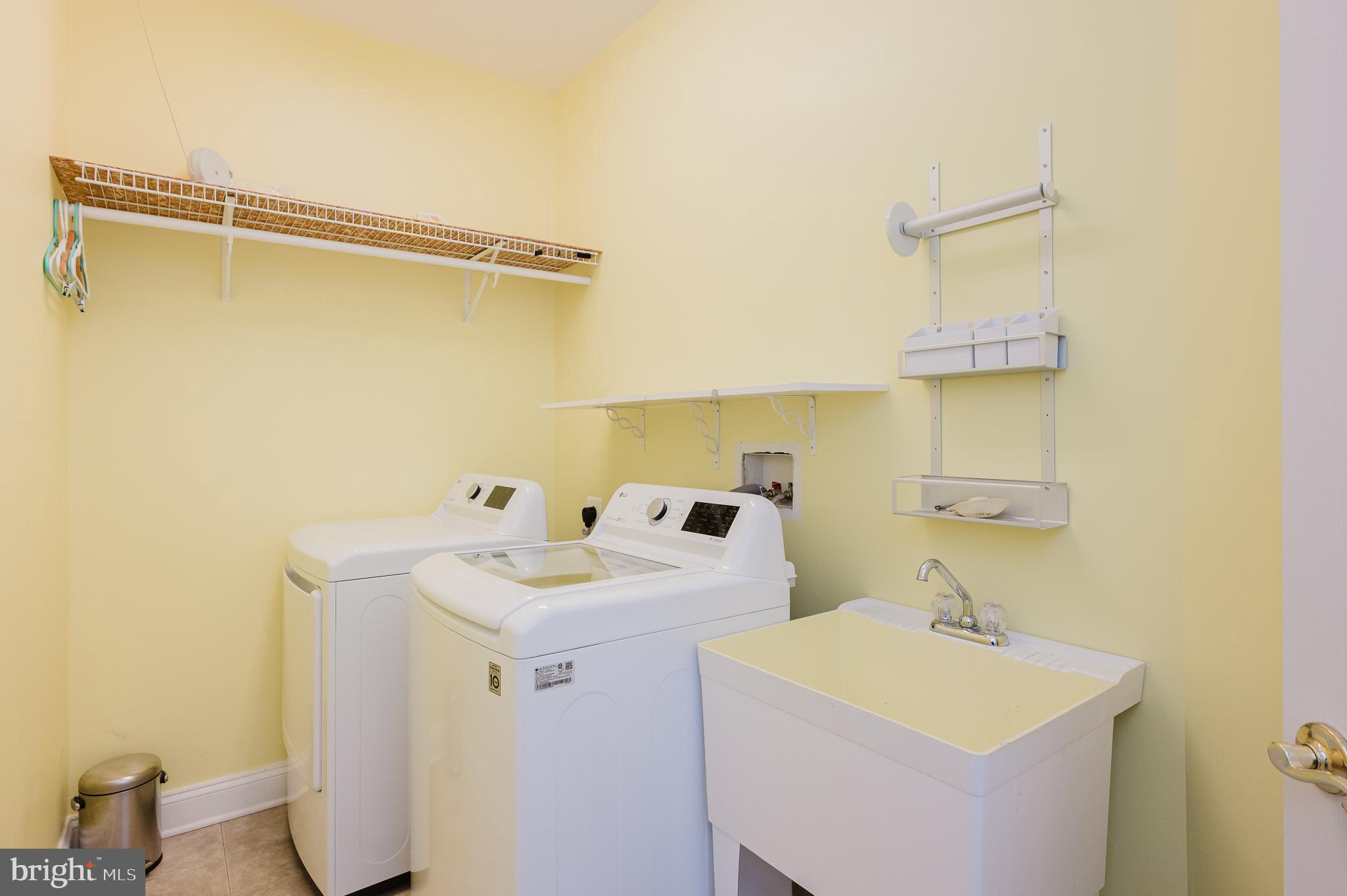 130 Fallston Meadow Court Fallston, MD 21047 - Photo 59 of 80 a utility room with dryer and washer