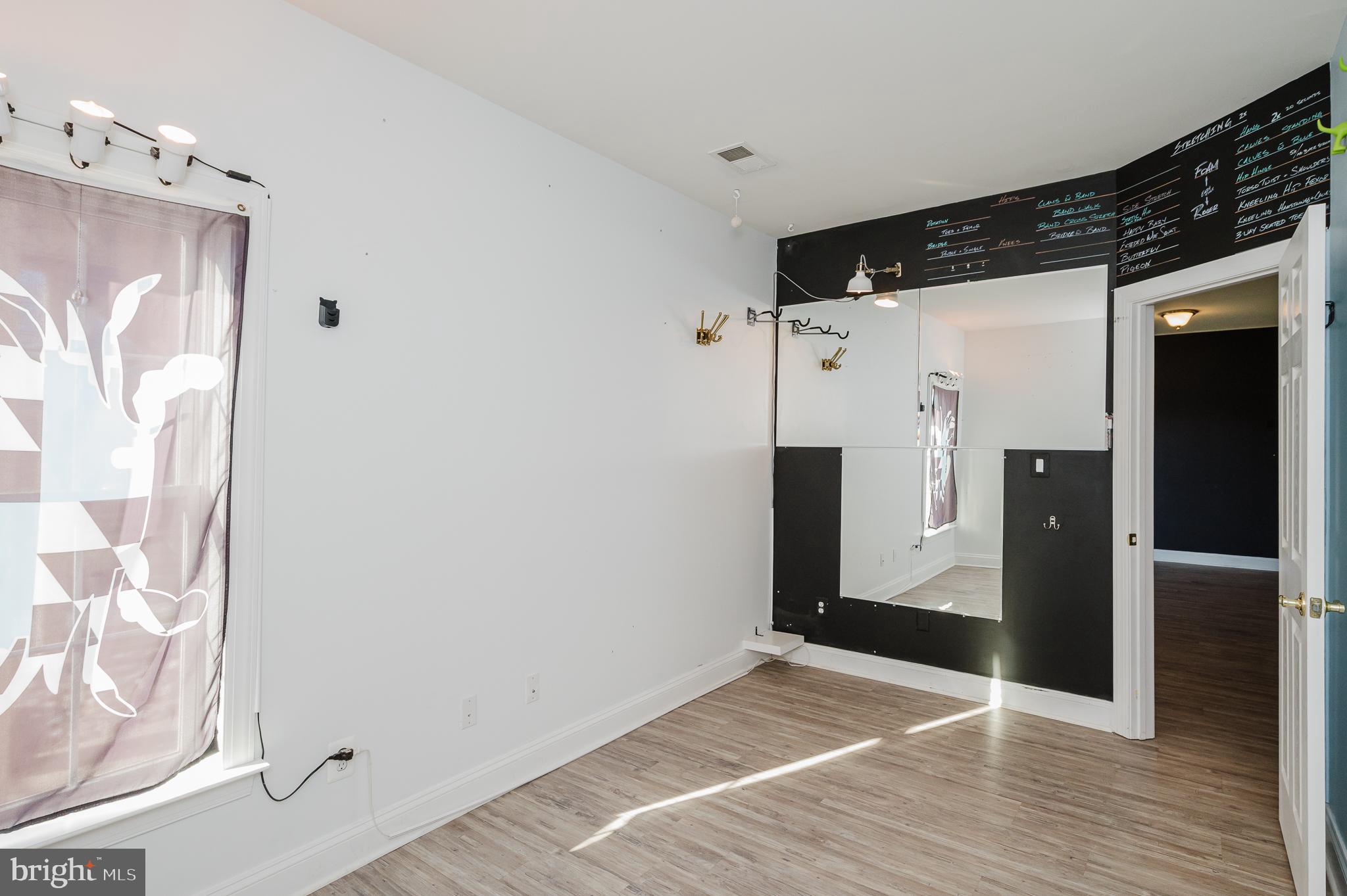 130 Fallston Meadow Court Fallston, MD 21047 - Photo 65 of 80 a view of a hallway with wooden floor