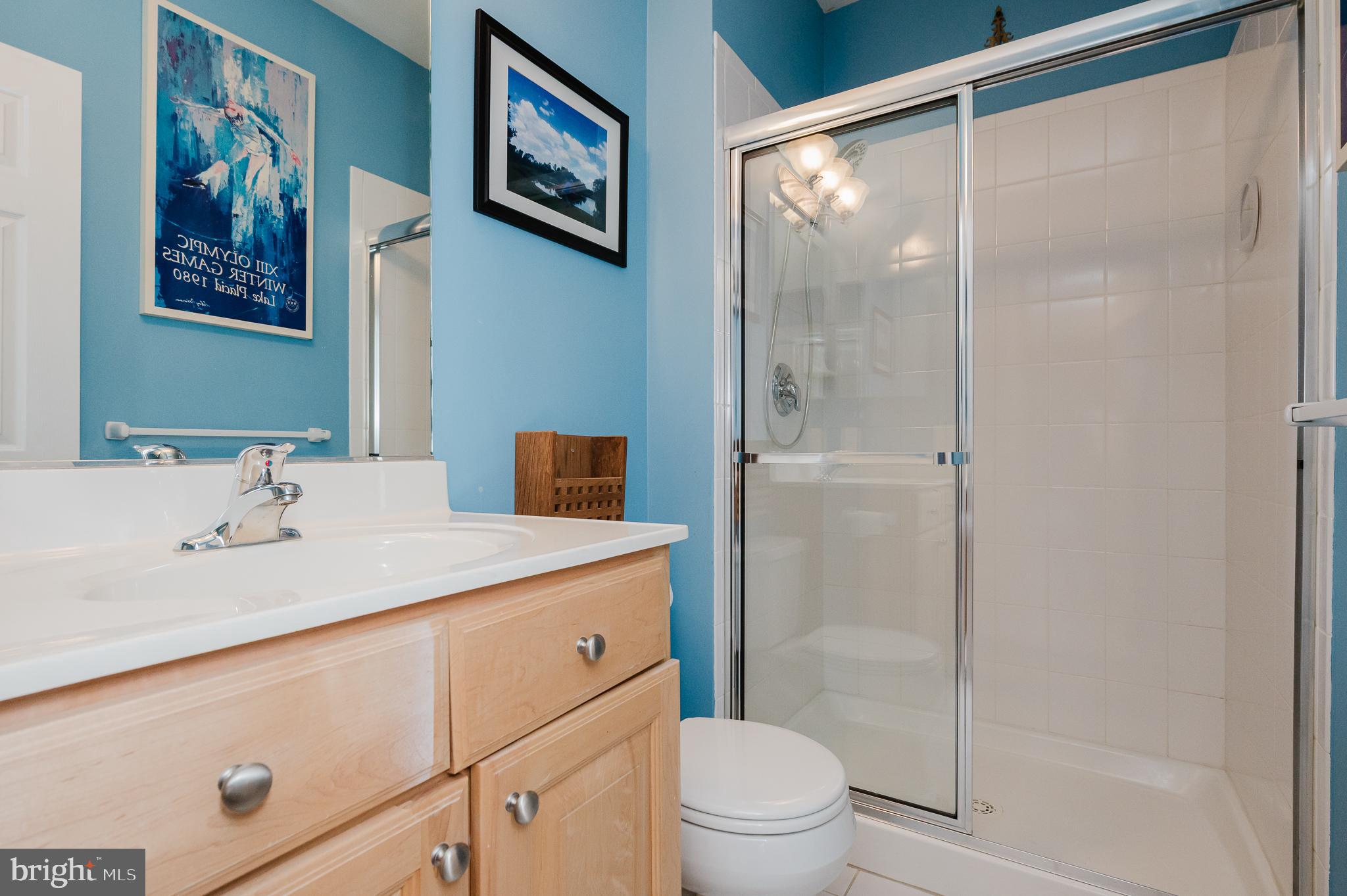 130 Fallston Meadow Court Fallston, MD 21047 - Photo 69 of 80 a bathroom with a granite countertop sink a toilet a shower and a mirror