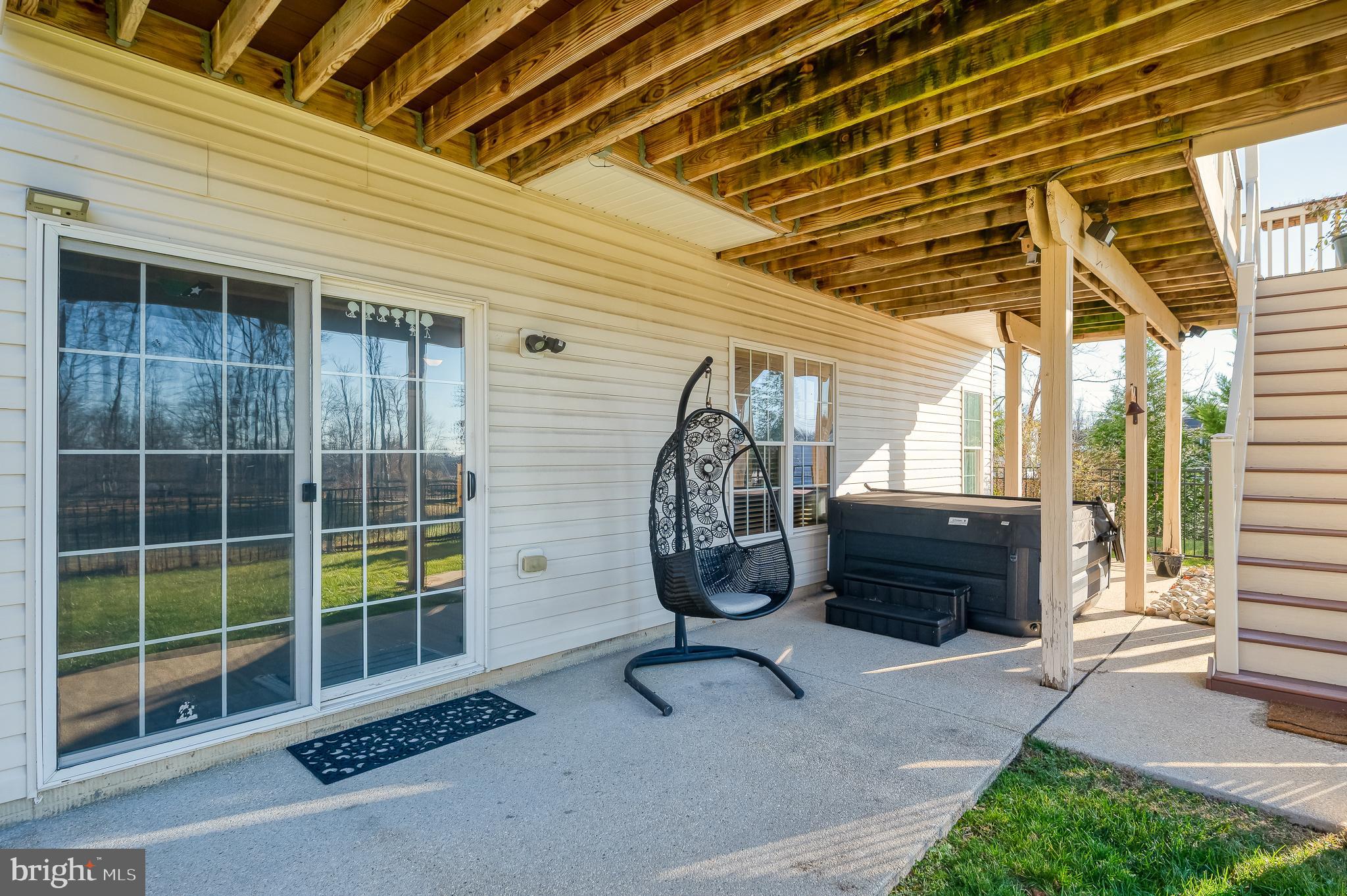 130 Fallston Meadow Court Fallston, MD 21047 - Photo 76 of 80 a view of a porch with a table and chairs