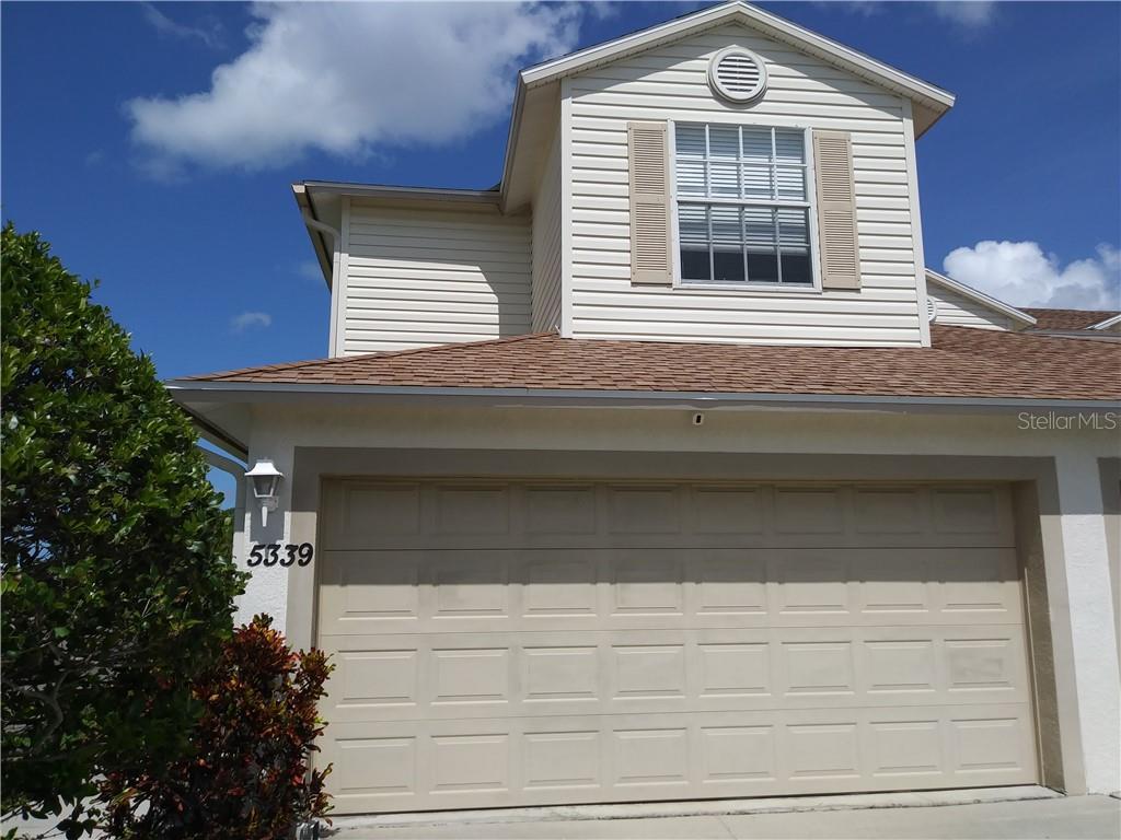 5339 Neil Drive St. Petersburg, FL 33714 - Photo 1 of 1 a front view of a house with a garage