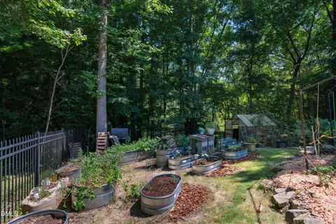 $975,000 | 212 Middlegreen Place, Holly Springs, NC 27540