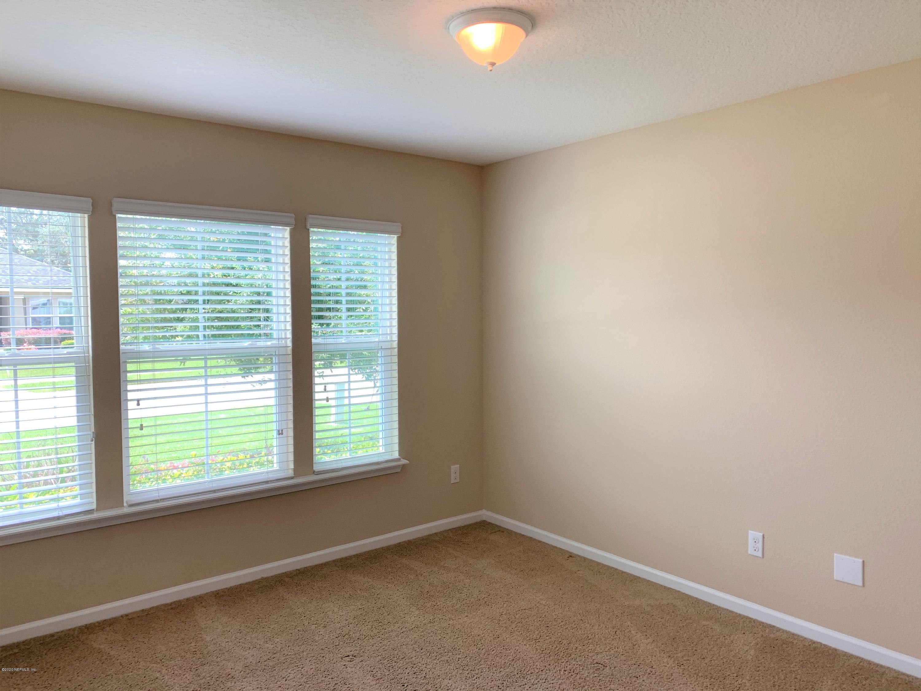 203 Providence Drive St. Augustine, FL 32092 - Photo 15 of 21 an empty room with a window