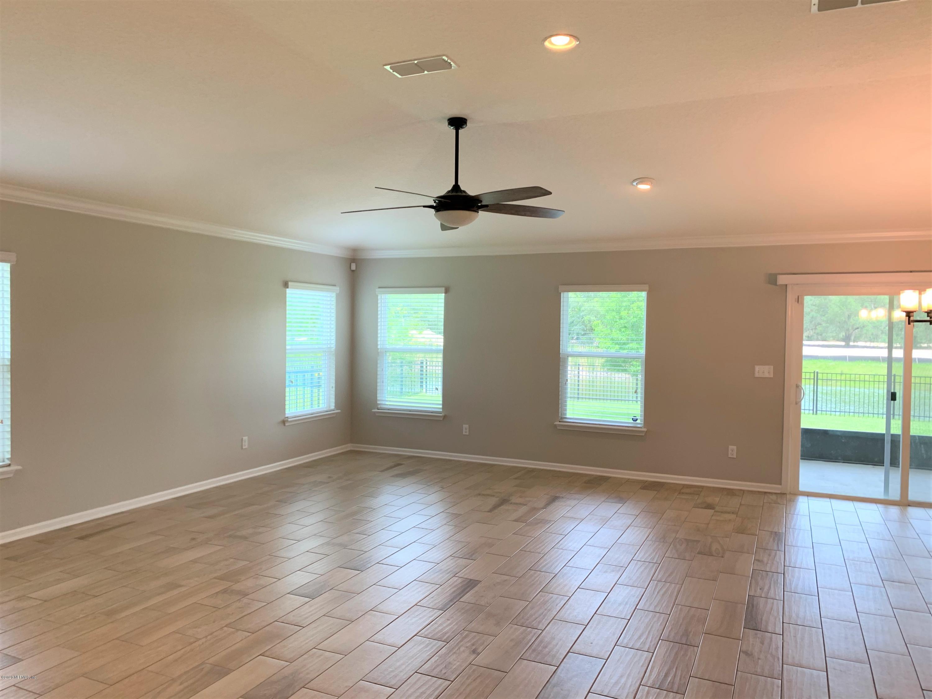 203 Providence Drive St. Augustine, FL 32092 - Photo 6 of 21 a view of an empty room with a window