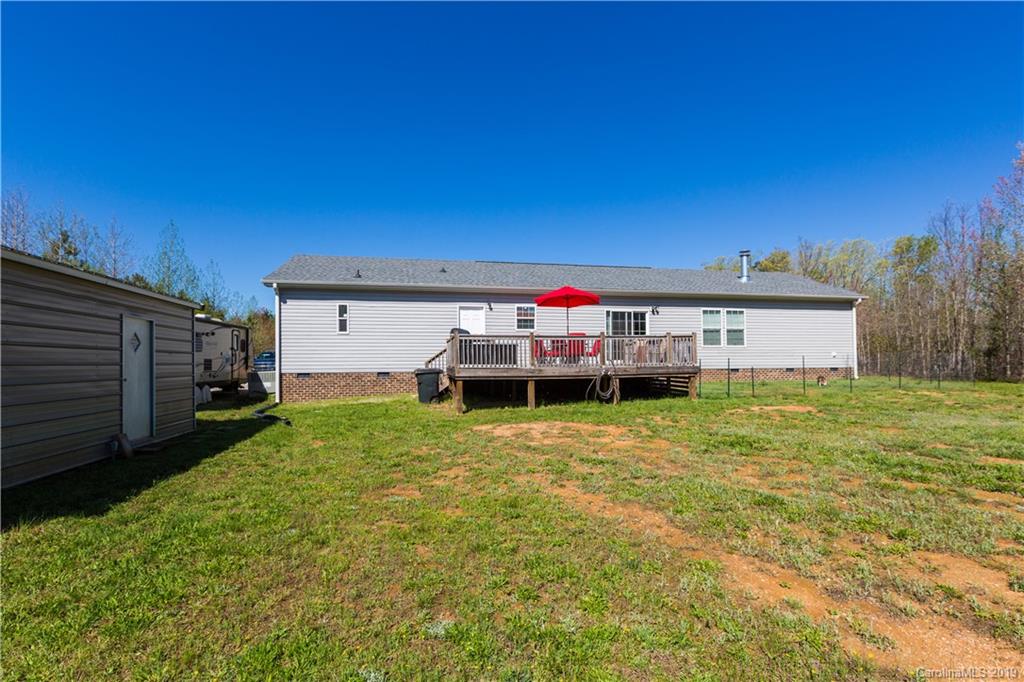 951 Stroupe Road Lancaster, SC 29720 - Photo 35 of 41 a view of a house with a backyard