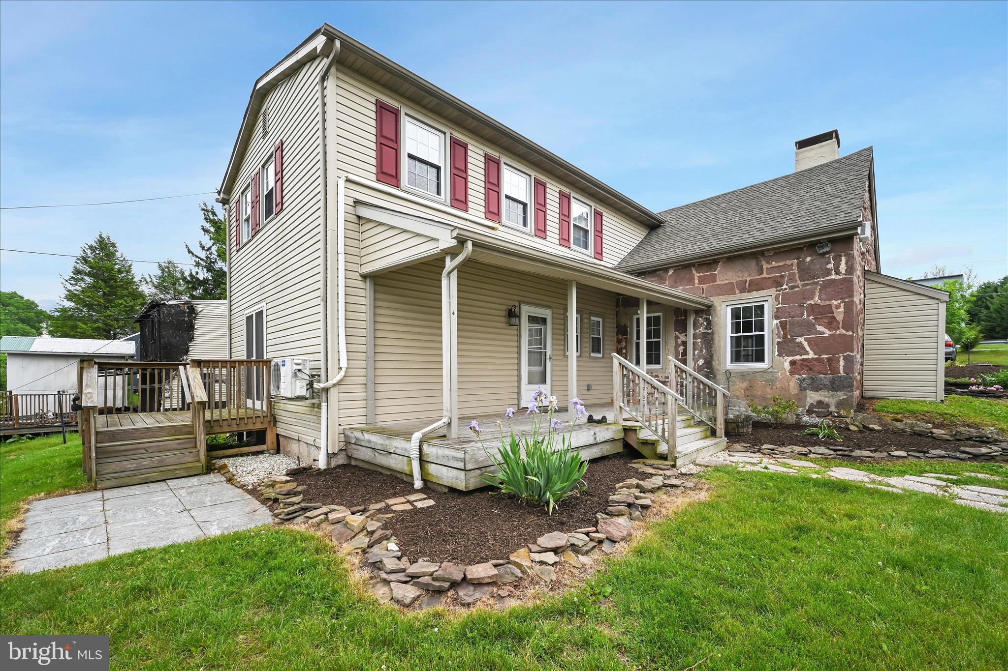 286 Schuylkill Road Birdsboro, PA 19508 - Photo 5 of 39 a front view of a house with a yard and outdoor seating