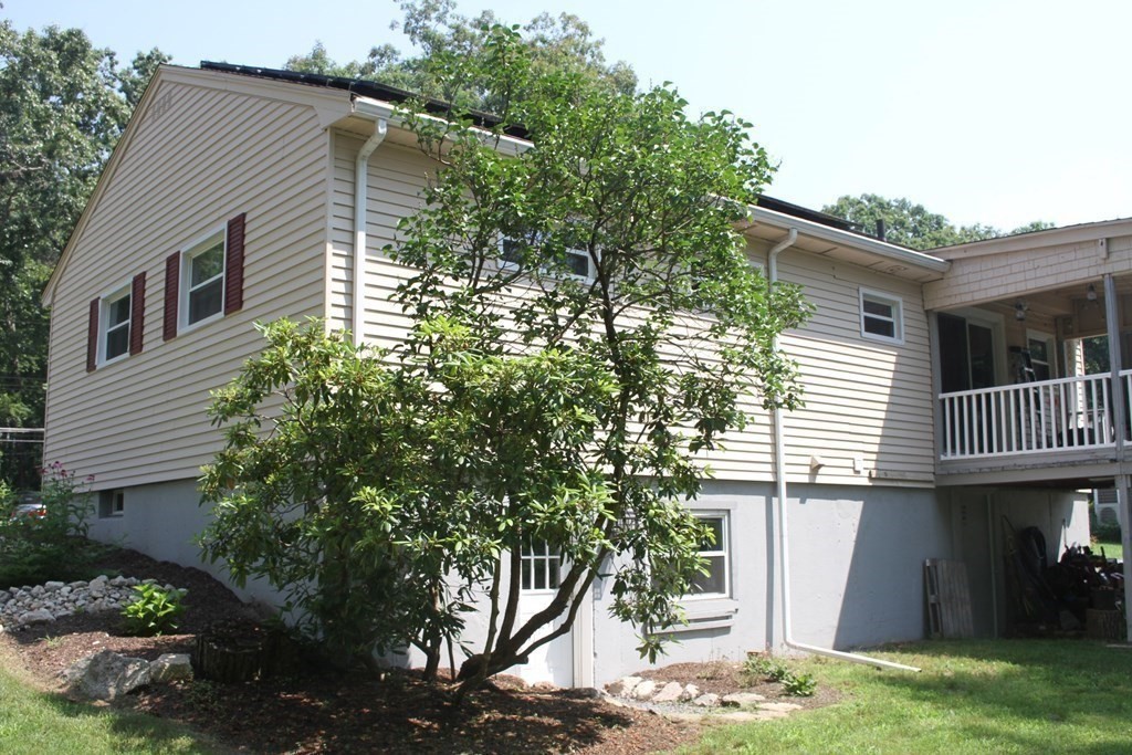 274 Cordaville Road Ashland, MA 01721 - Photo 37 of 42 a backyard of a house with plants and trees
