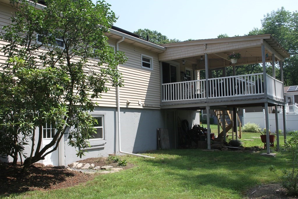 274 Cordaville Road Ashland, MA 01721 - Photo 4 of 42 a view of a deck with a chair