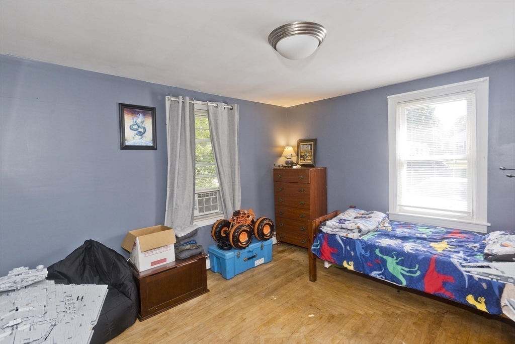 2278-2280 Main Street Three Rivers, MA 01080 - Photo 19 of 37 a bedroom with bed and a window
