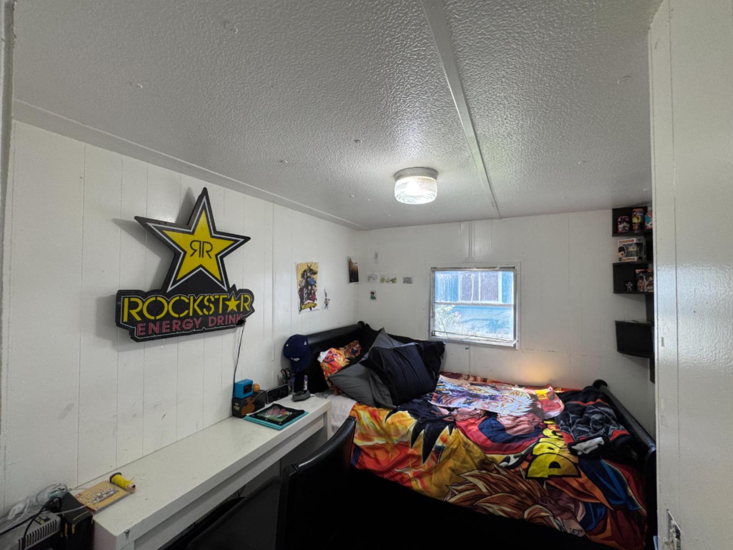 1781 Franklin Road, Unit 36 Yuba City, CA 95993 - Photo 7 of 12 a bedroom with a bed and furniture