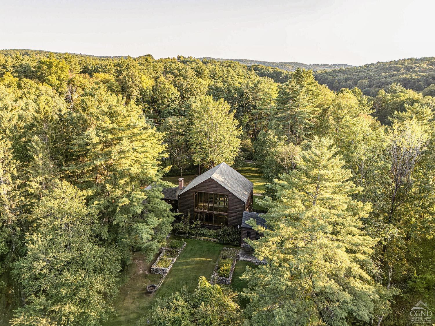 1039 County Route 13 Chatham, NY 12136 - Photo 3 of 48 a house view with a garden space